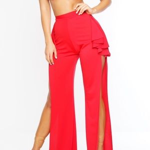 Red two piece crop top and high waisted pants